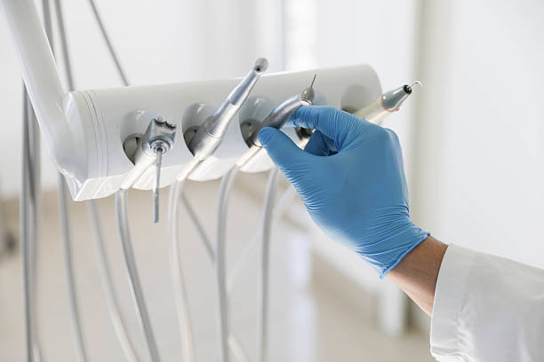 Professional Tooth Extraction technician working in St. Helens, OR